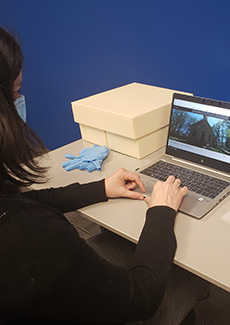 Women typing on a laptop. 
