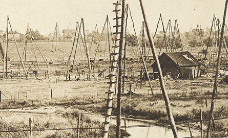 Sephia coloured image of an oil field.