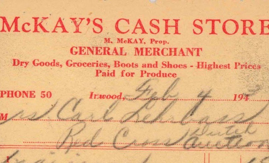 A handwritten 1940s receipt from McKay's Cash Store in Inwood, listing grocery items and prices for the Red Cross, stamped "PAID" in purple ink.