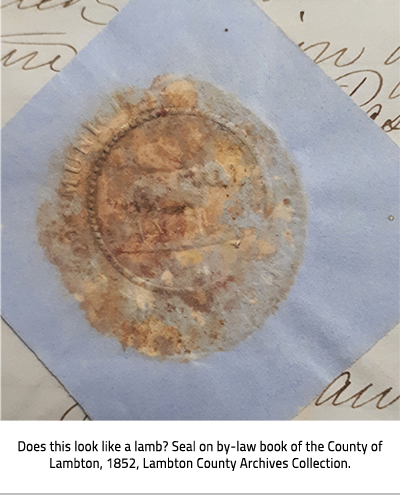Bronze. Caption: "Does this look like a lamb? Seal on by-law book of the County of Lambton, 1852, Lambton County Archives Collection.", link.