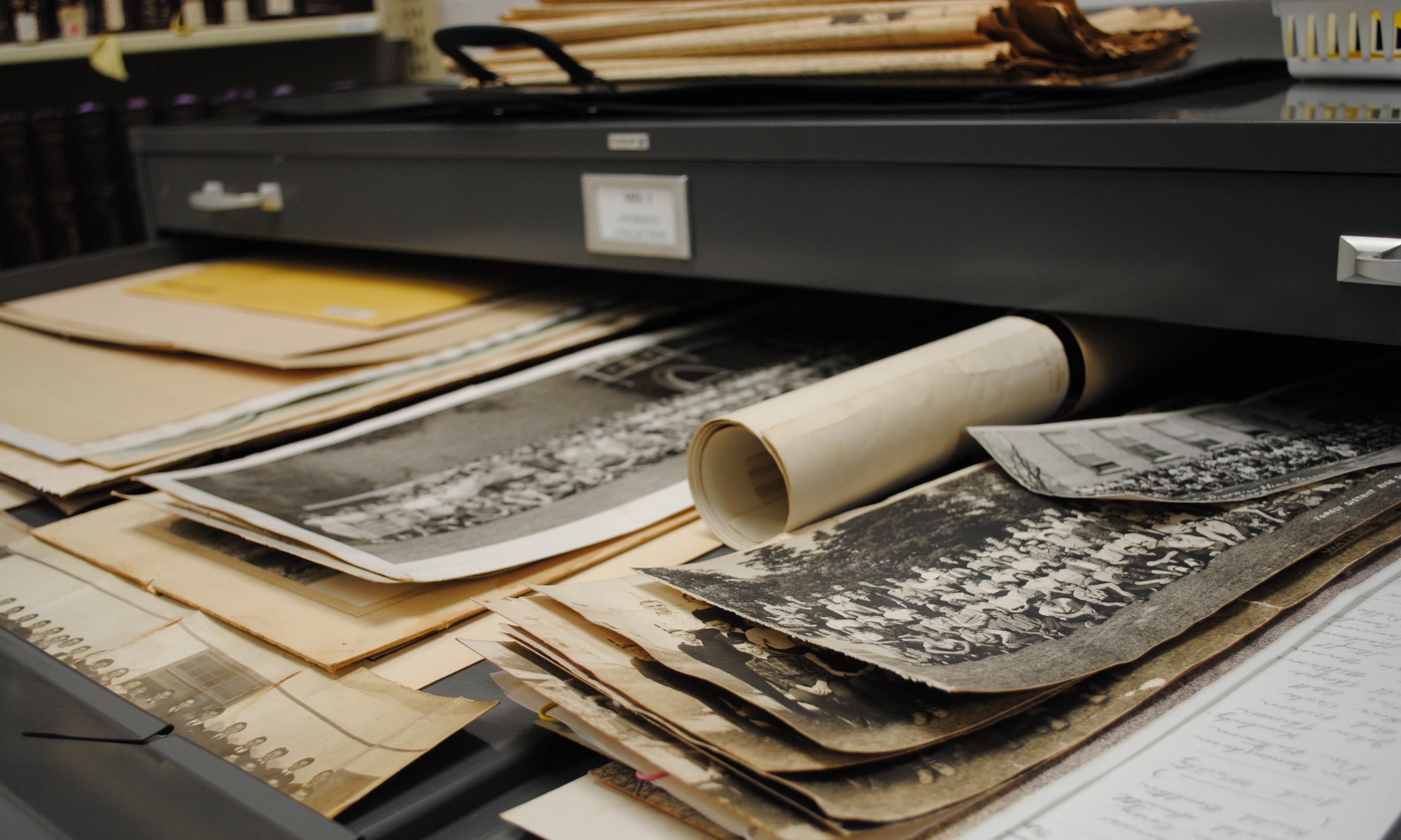 Scrolls on a shelf. 